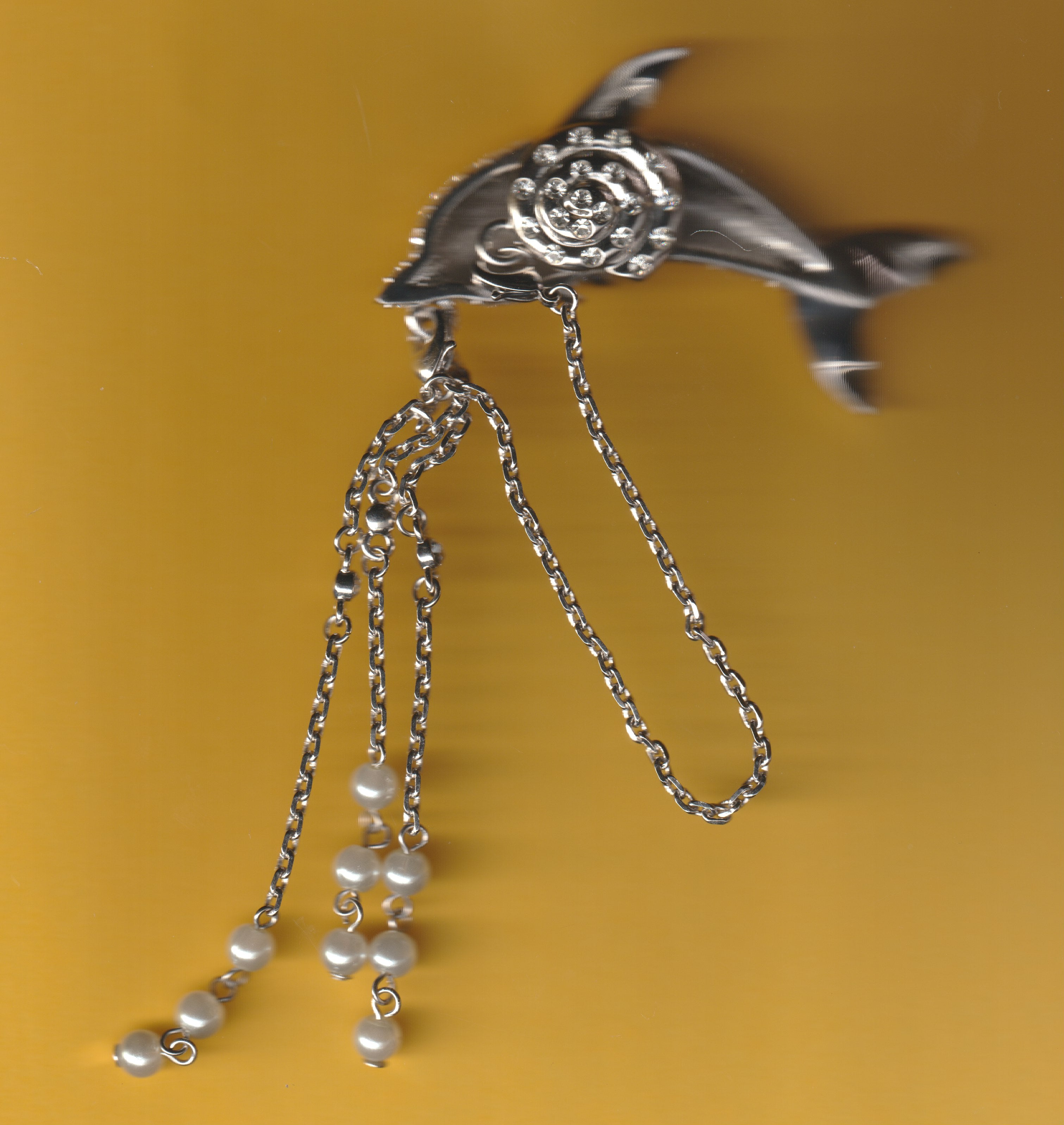 "DELPHINI" brooch